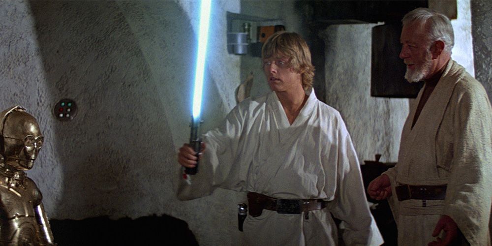 Mark Hamill as Luke Skywalker and Alec Guiness as Obi Wan Kenobi