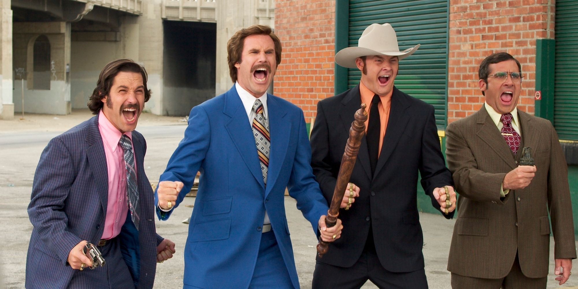 Paul Rudd, Will Ferrell, David Koechner, and Steve Carell preparing for battle in Anchorman: The Legend of Ron Burgundy