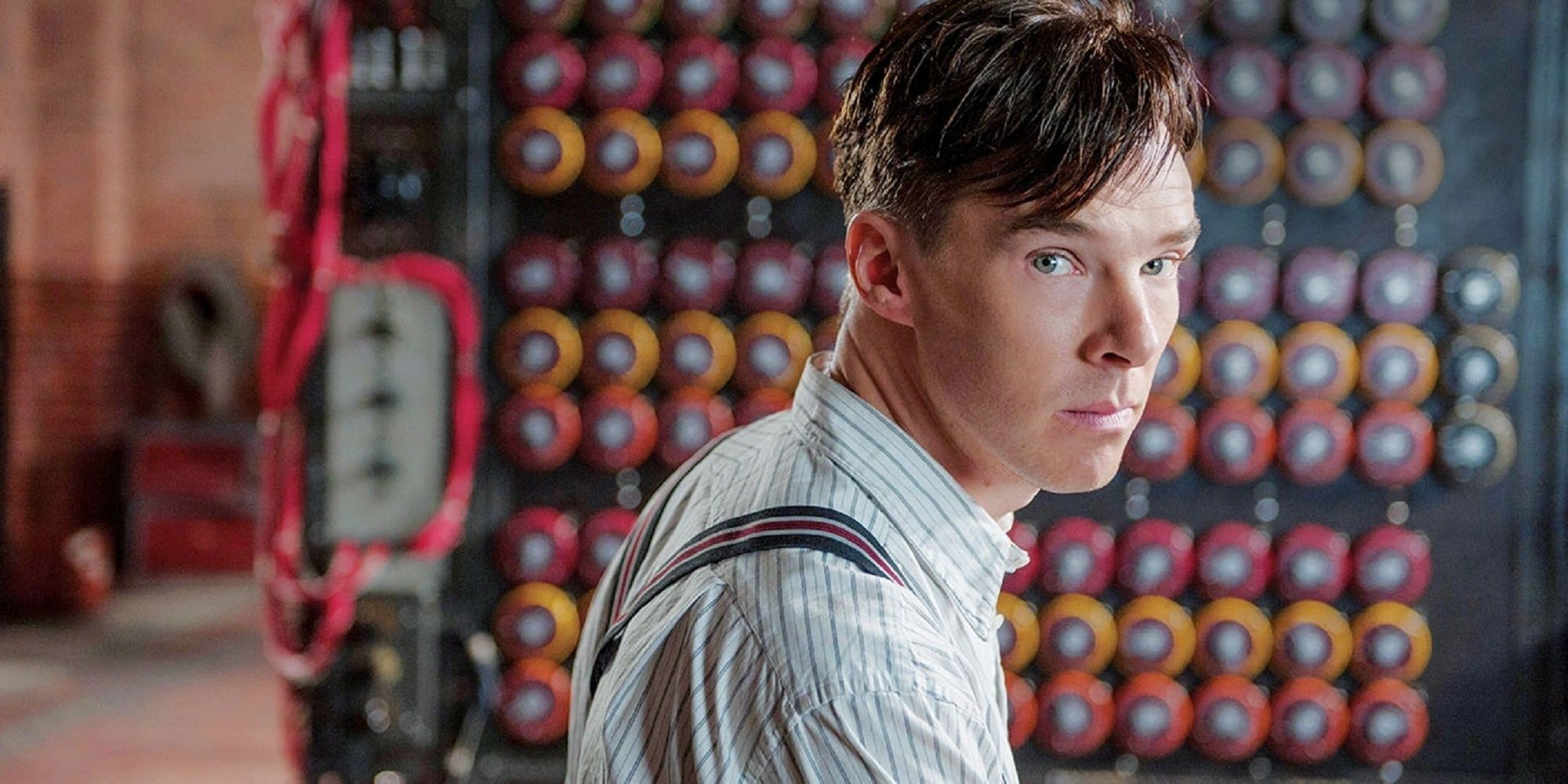 Alan Turing turning back to look at the camera in The Imitation Game.