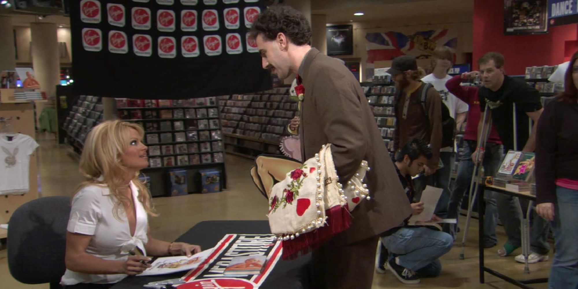 Sacha Baron Cohen as Borat, trying to get a meeting with Pamela Anderson in 2006's Borat