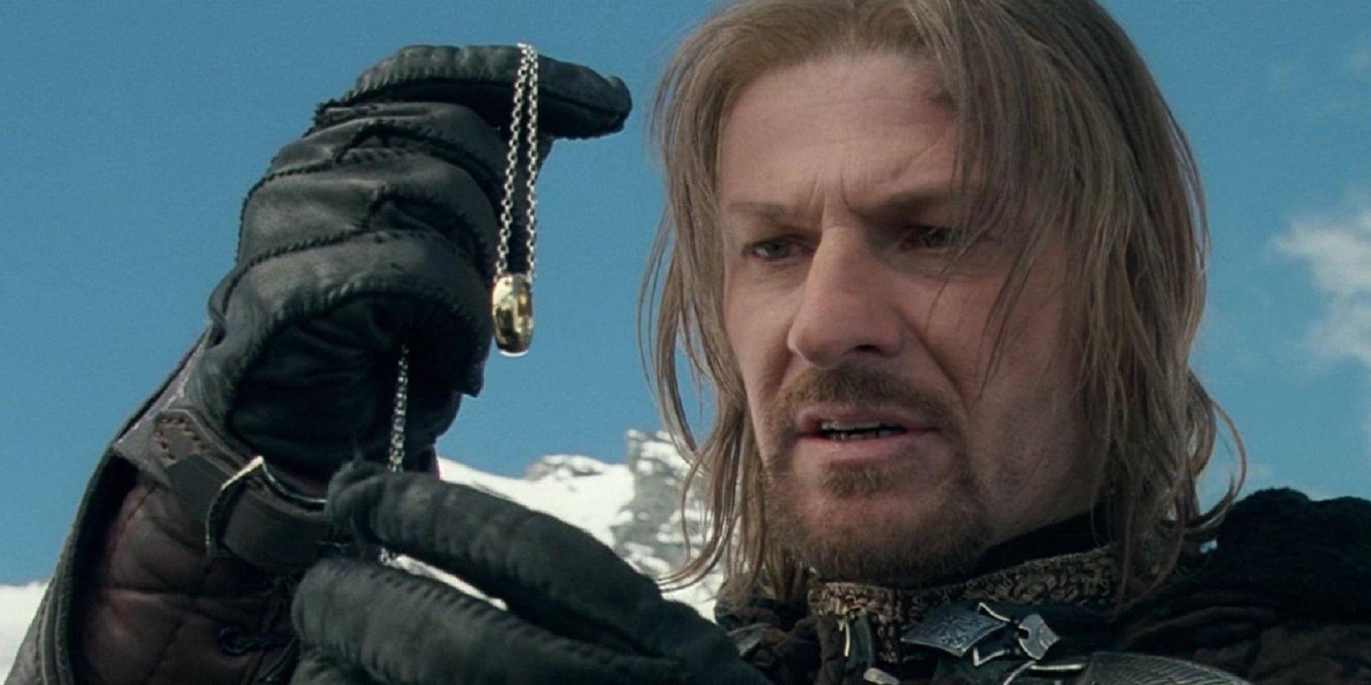 Sean Bean as Boromir holding the ring in The Lord of the Rings: The Fellowship of the Ring