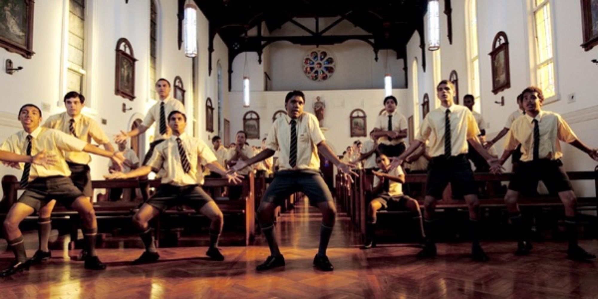 Boys dancing in the church pews
