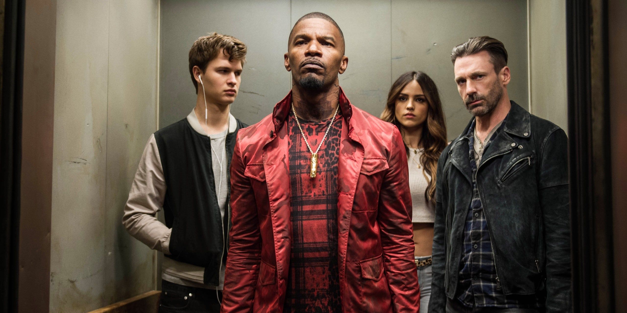 The heist crew in 'Baby Driver' riding an elevator in silence