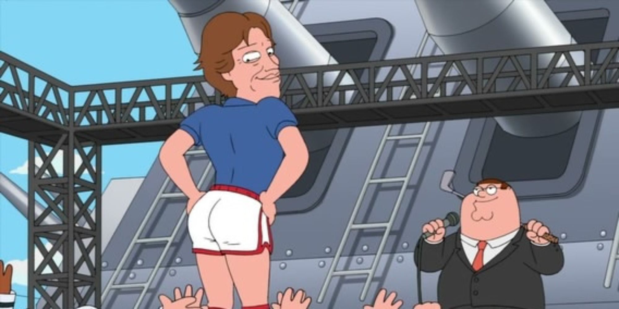 Bruce Jenner dancing with Peter standing in the background