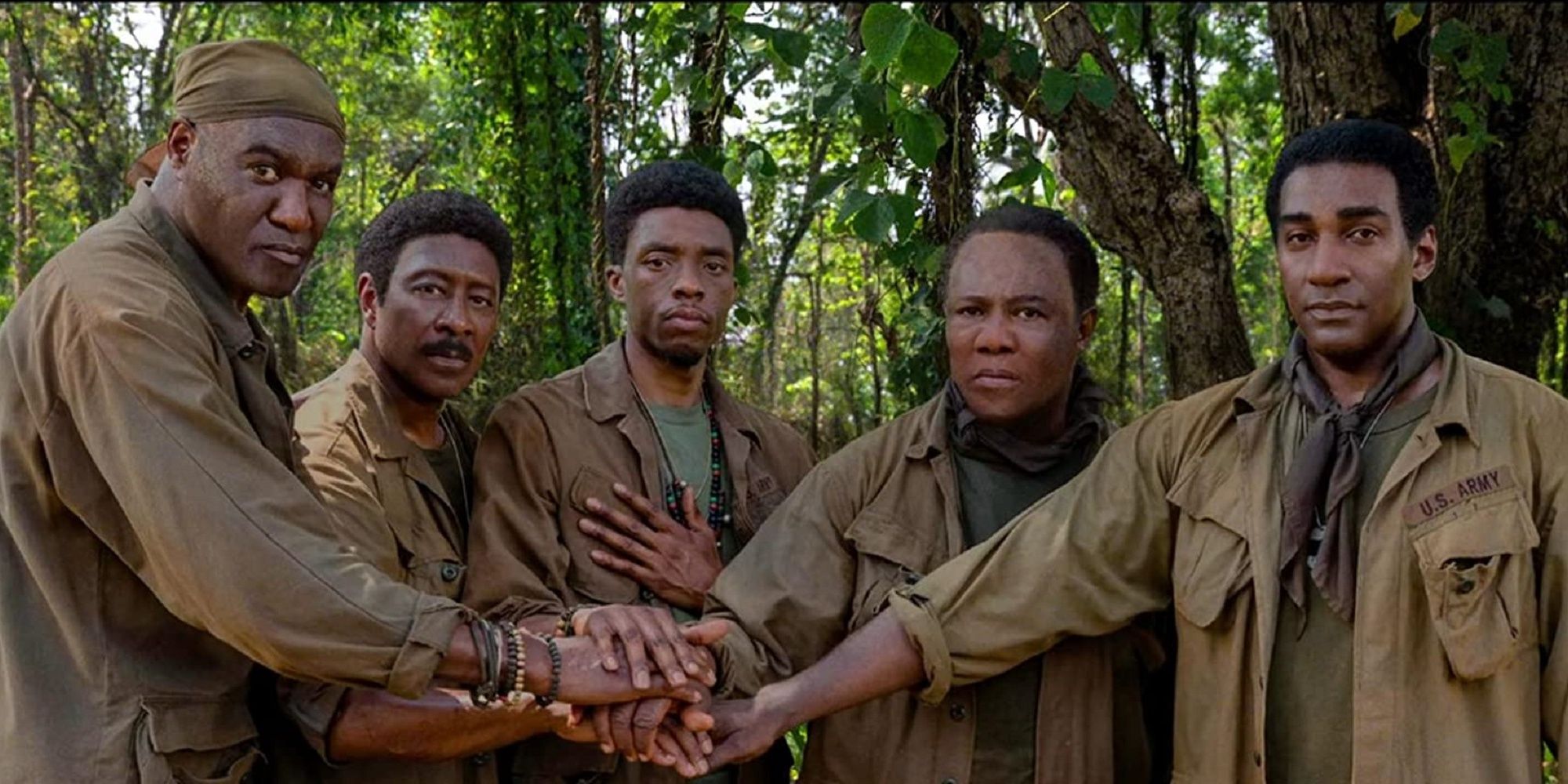 Chadwick Boseman with castmates in Da 5 Bloods.