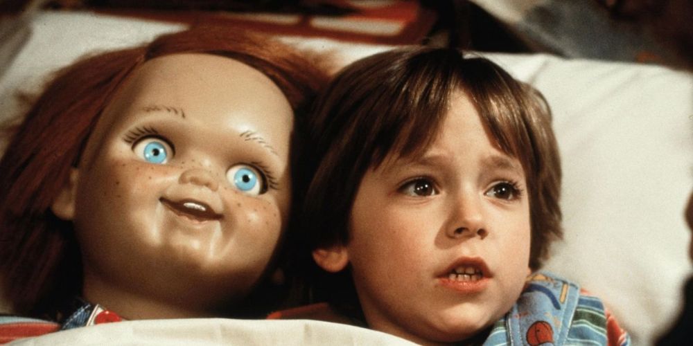 Alex Vincent in bed with Chucky in Child's Play
