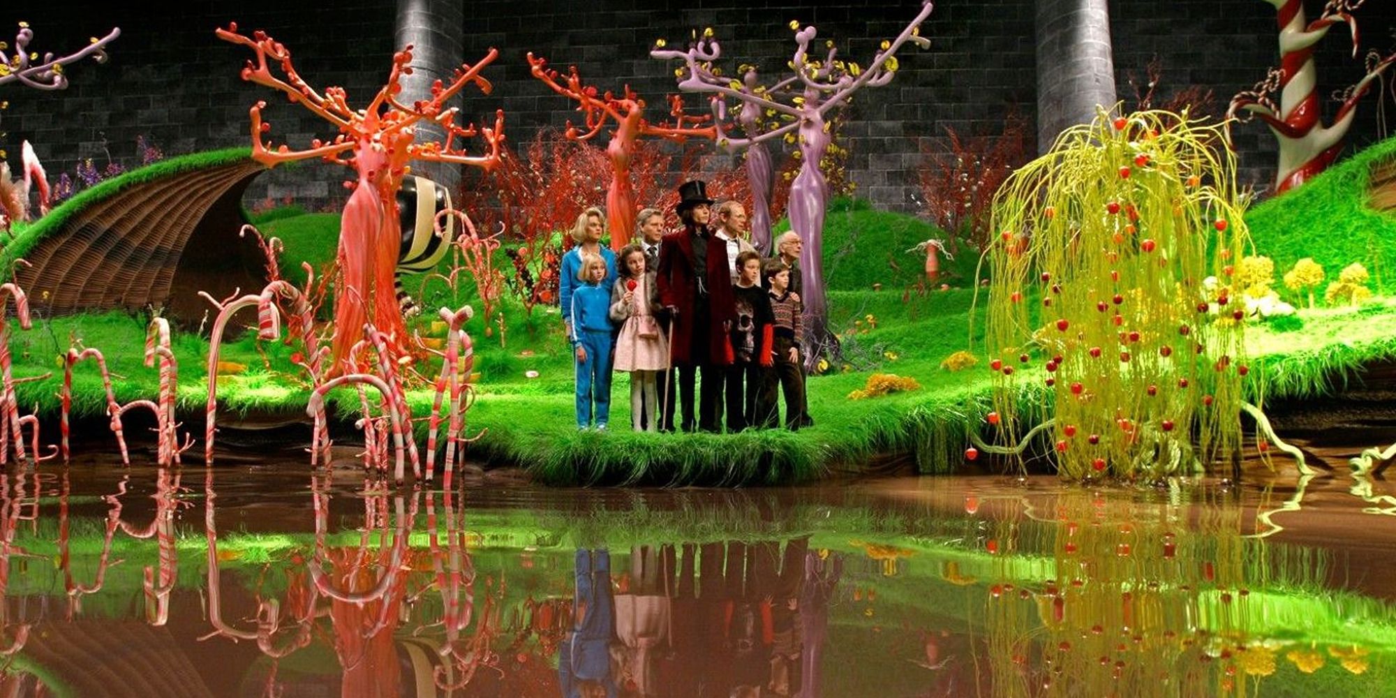 Wonka and company in front of the chocolate river from Charlie and the Chocolate Factory