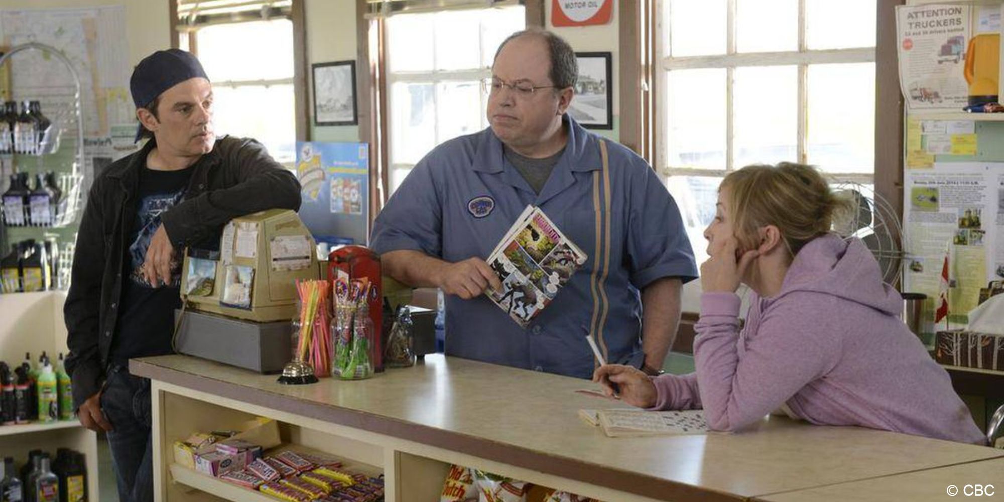 Corner Gas_Hank Brent and Wanda stand at Corner Gas counter