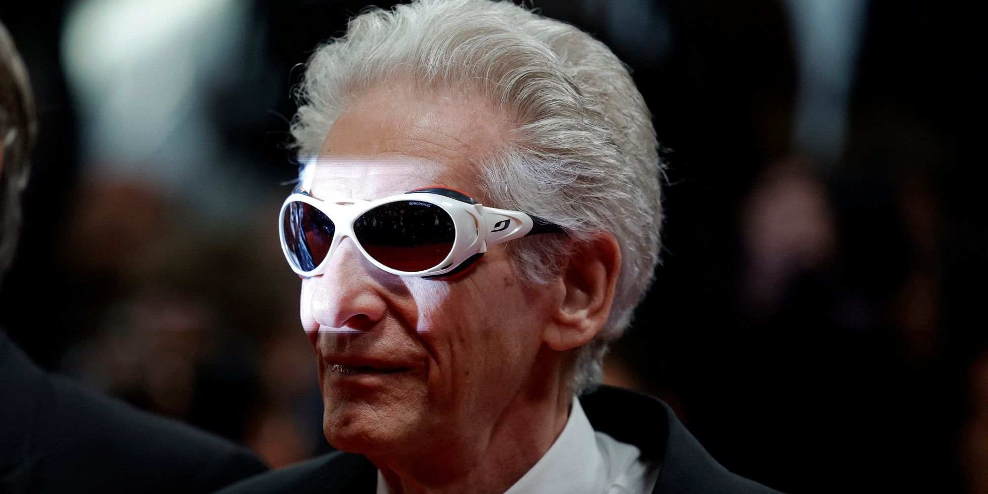 David Cronenberg in sunglasses at film premiere.