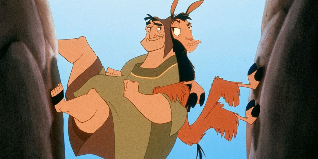Emperor Kuzco and Pacha scale the walls of a narrow valley together. 