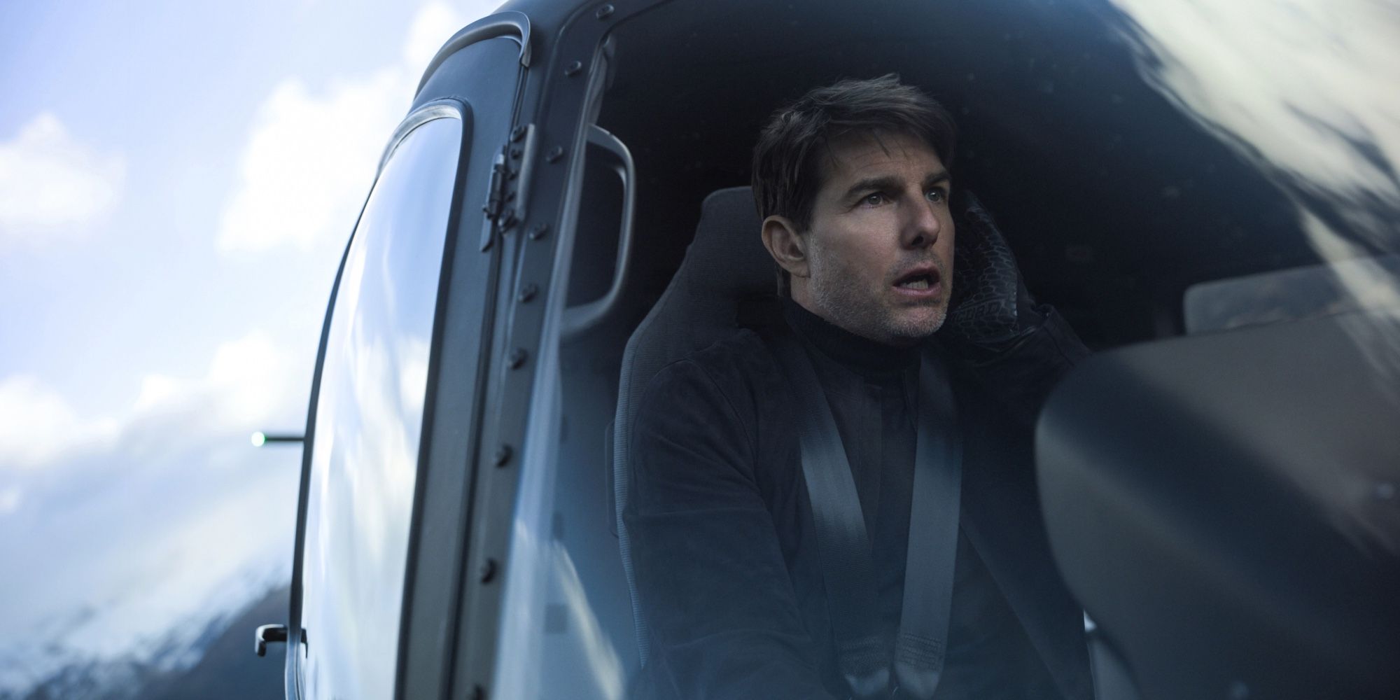 Ethan Hunt (Tom Cruise) flies a helicopter in pursuit of his enemy.