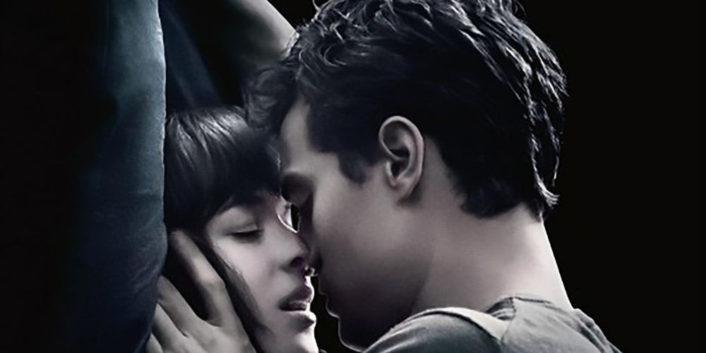 Dakota Johnson and Jamie Dornan as Anastasia and Christina about to kiss in Fifty Shades Of Grey