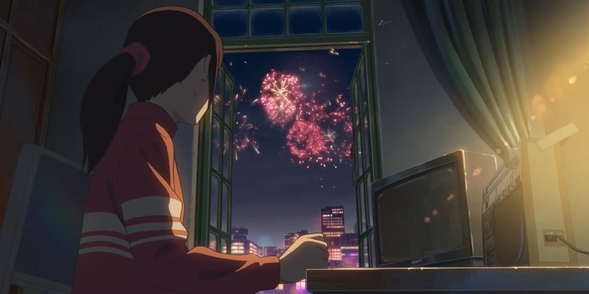 A girl staring out at fireworks in 