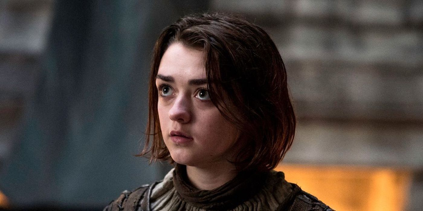 Maisie Williams as Arya Stark looking up in Game of Thrones