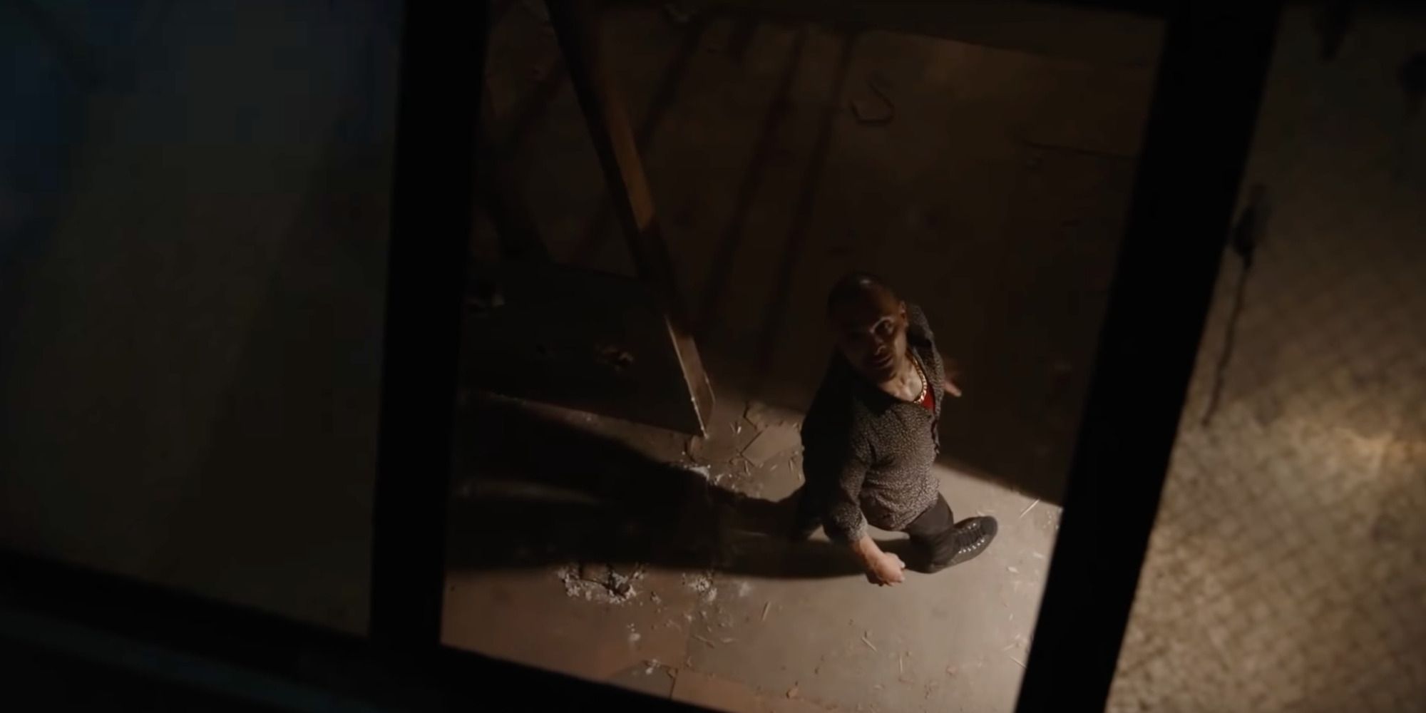 Nacho from "Better Call Saul", looking at the sky through the open ceiling