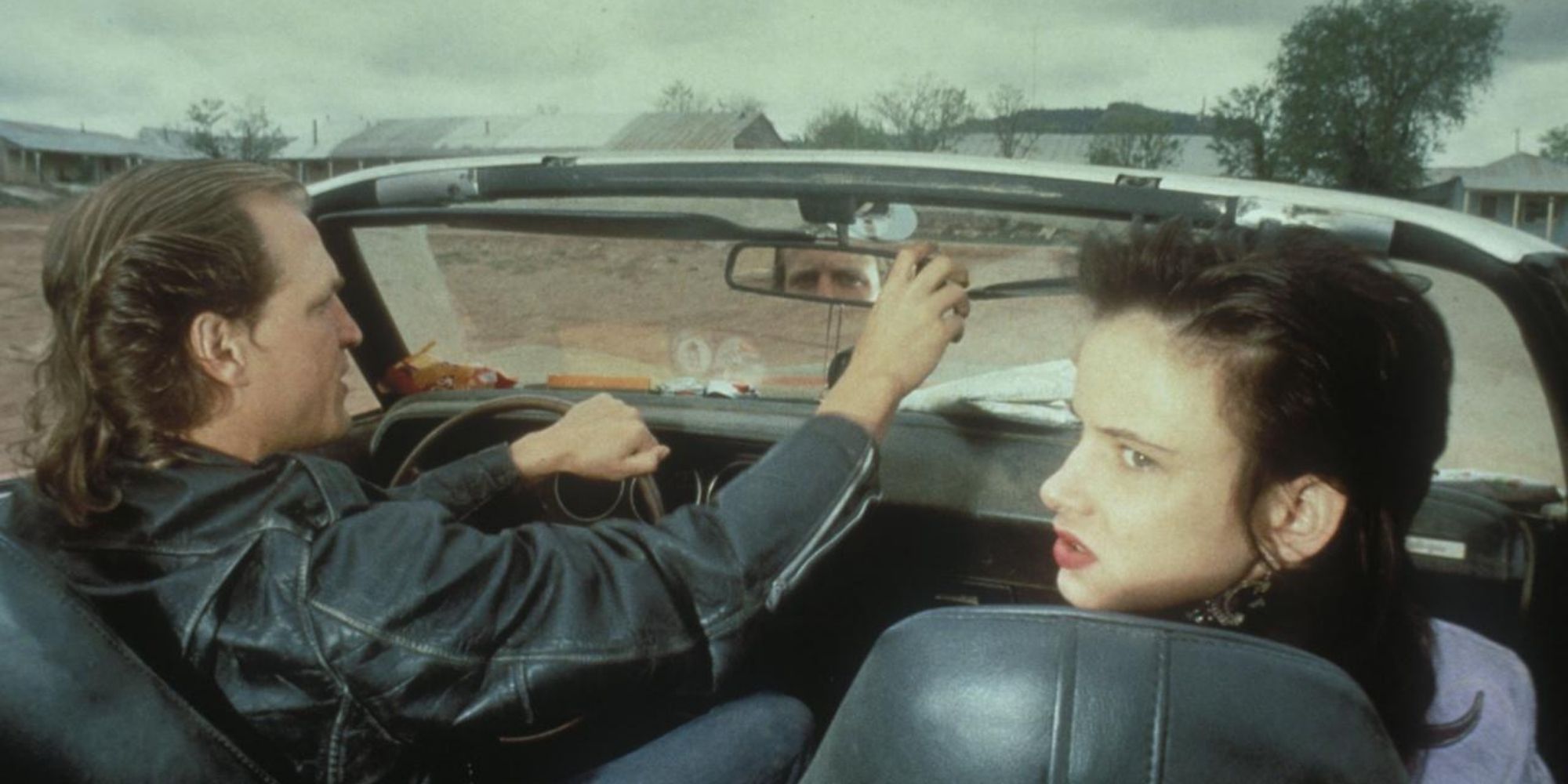 Woody Harrelson as Mickey and Juliette Lewis Mallory driving in 'Natural Born Killers' (1994)
