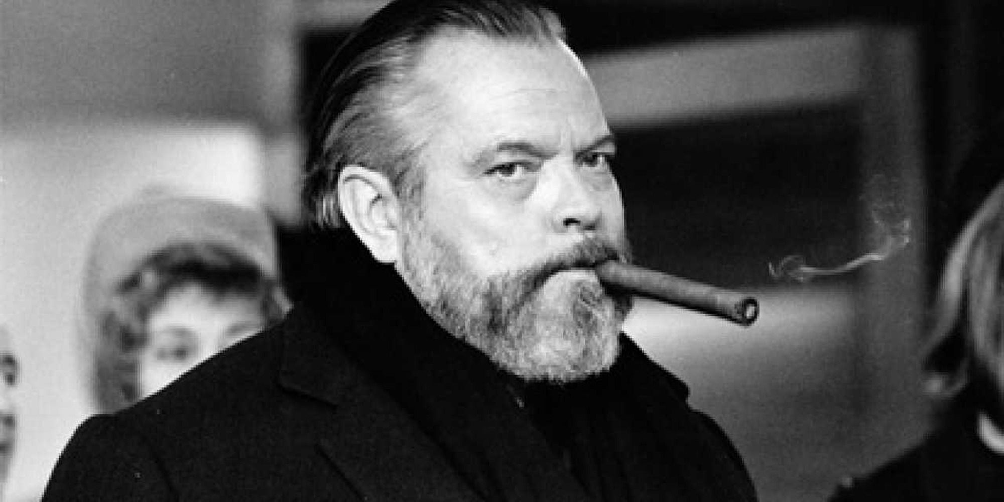 Orson Welles smoking a cigar
