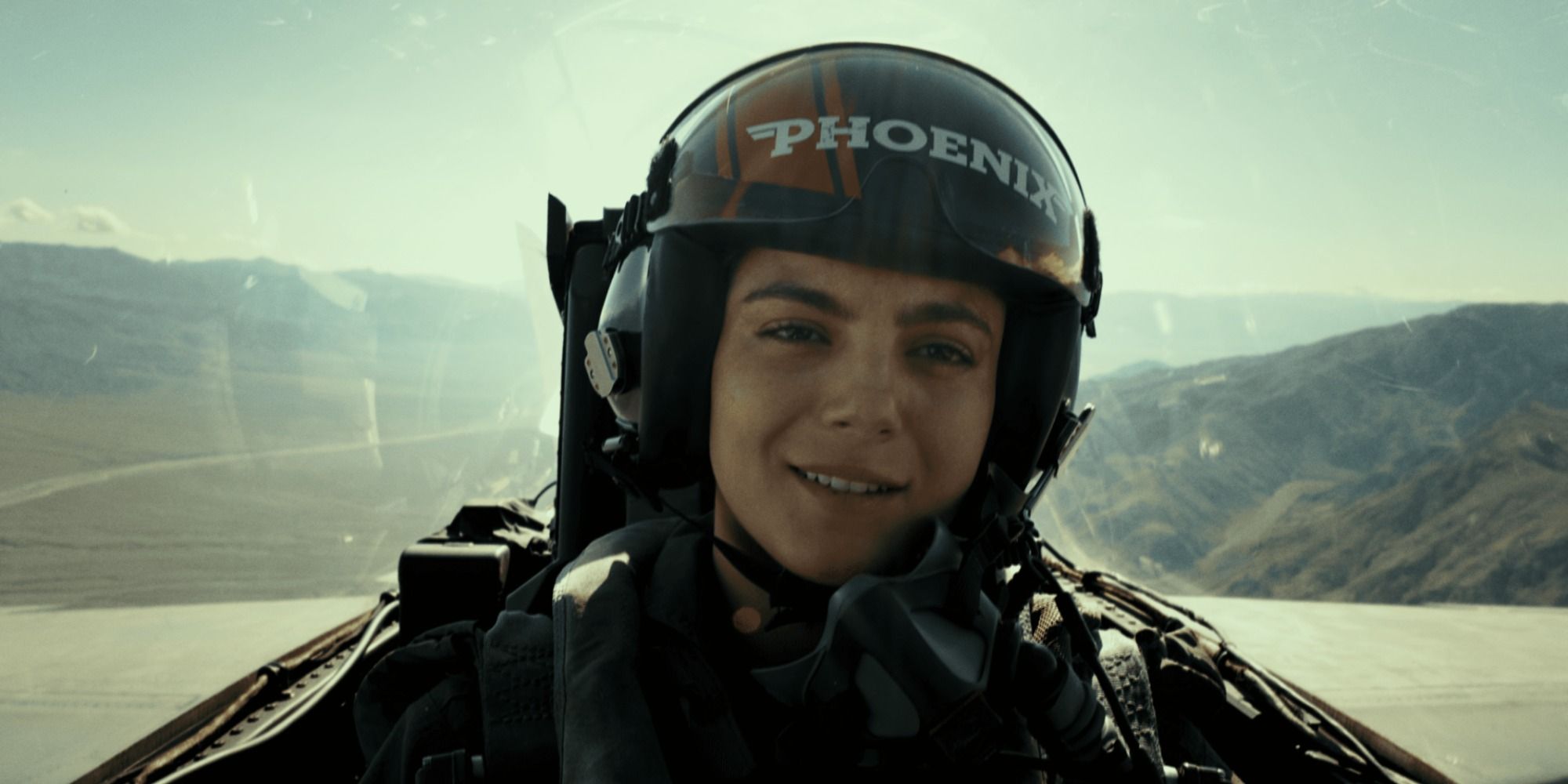 Monica Barbaro flying as a phoenix in the cockpit