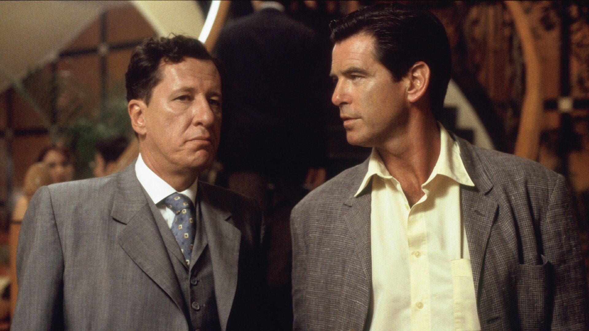 Pierce Brosnan and Geoffrey Rush in The Tailor of Panama