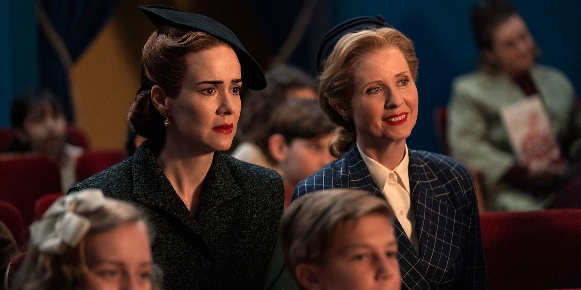 Sarah Paulson as Mildred Ratched and Cynthia Nixon as Gwendoline watch a puppet show in Ratched