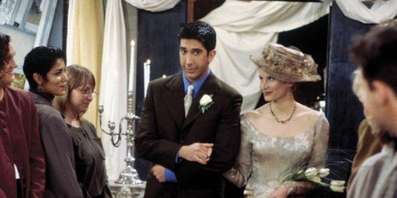 ross walks carol down aisle