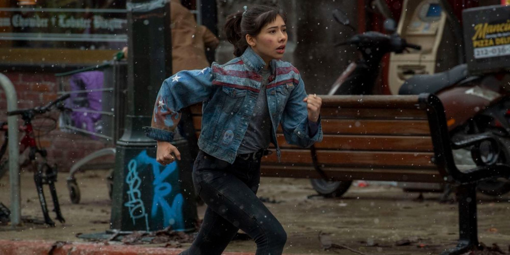 A teenage girl running on the street