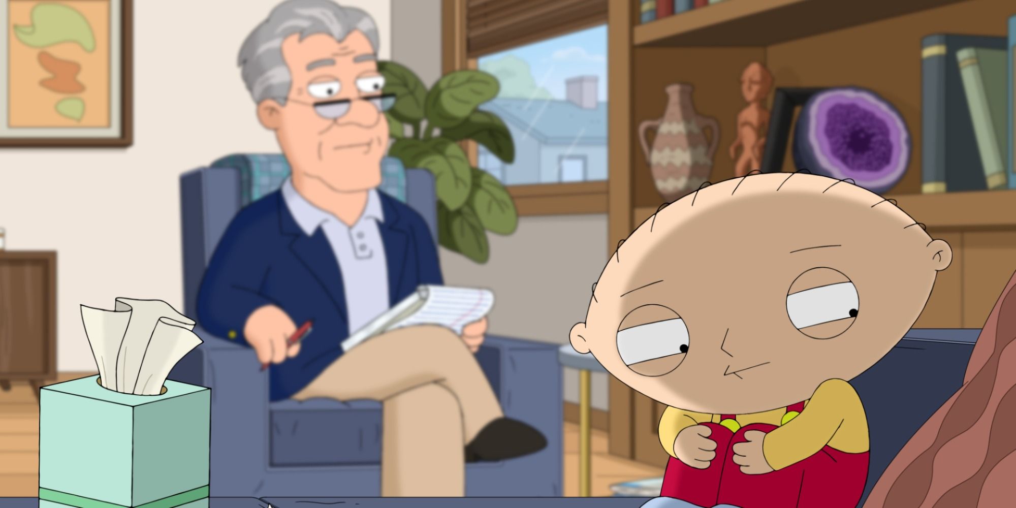 Stewie accroupi dans un coin d'un bureau