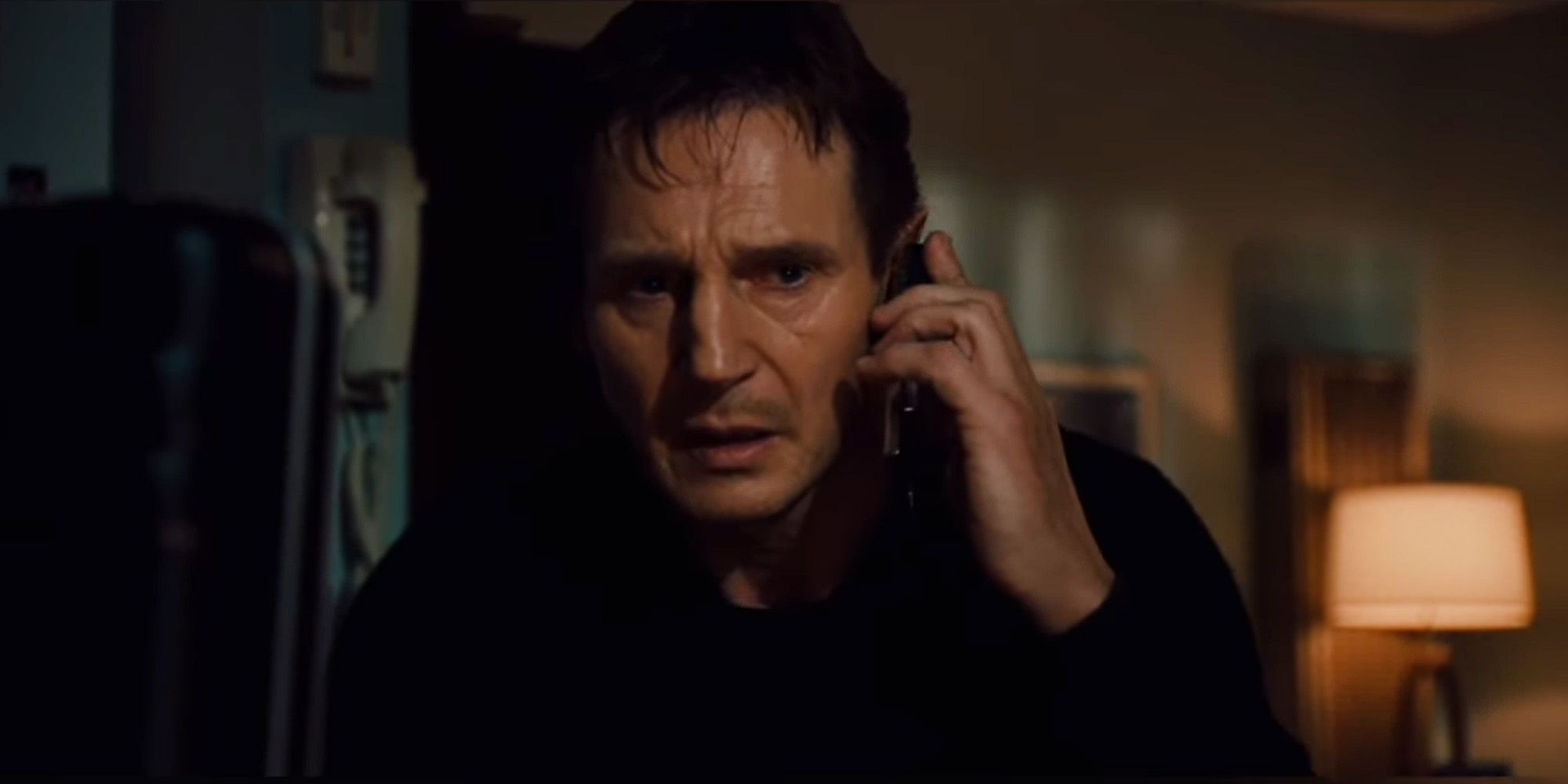 Liam Neeson as Bryan Mills on the phone in Taken