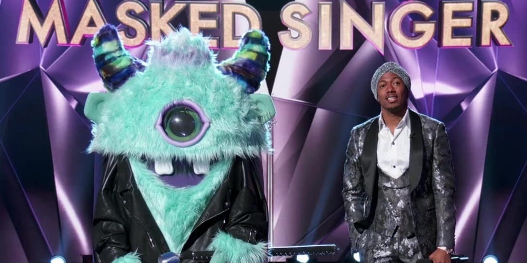 Nick Cannon and T-Pain (wearing a monster costume) in 'The Masked Singer'