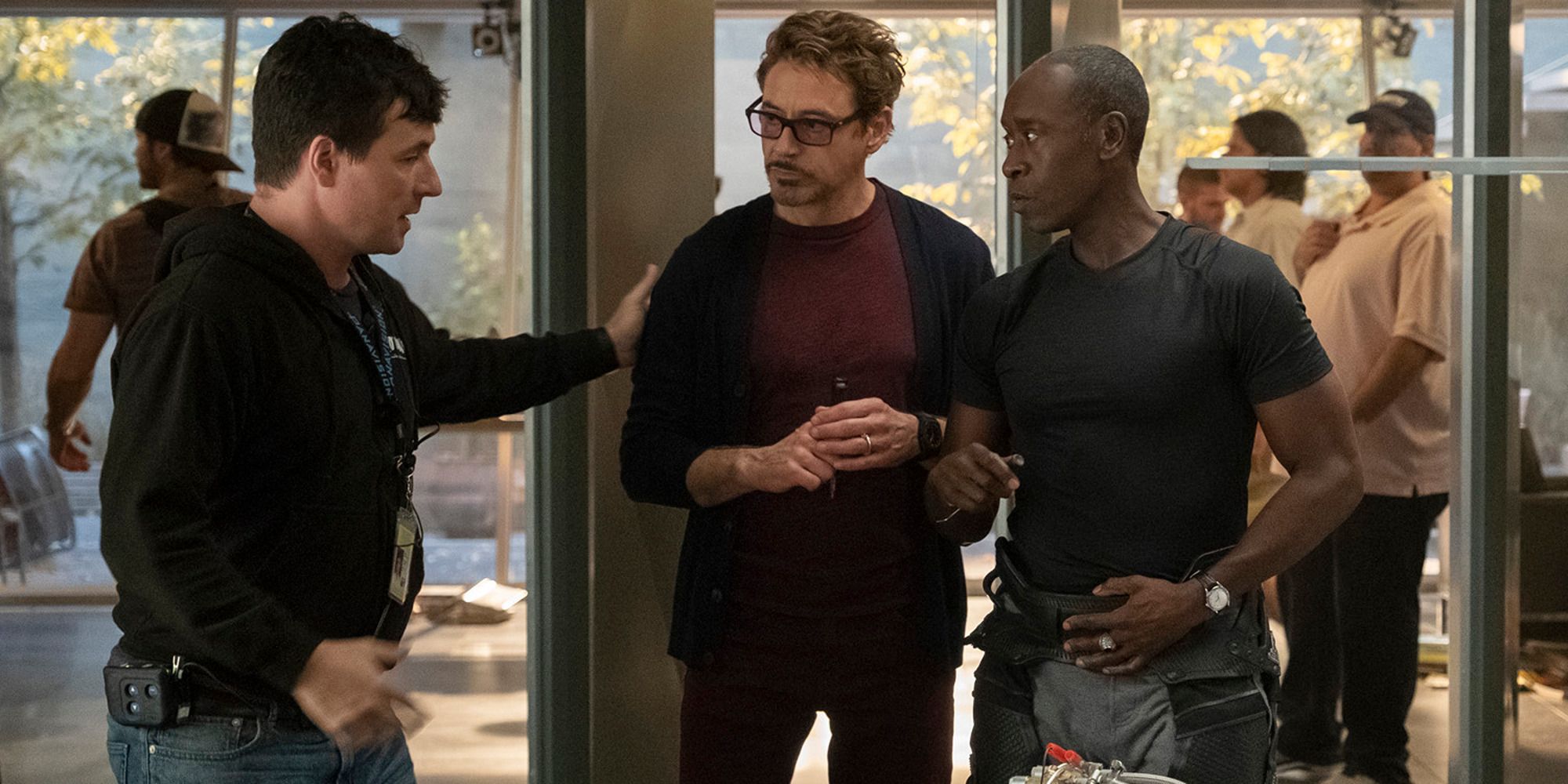 cinematographer Trent Opaloch talking with Robert Downey Jr and Don Cheadle
