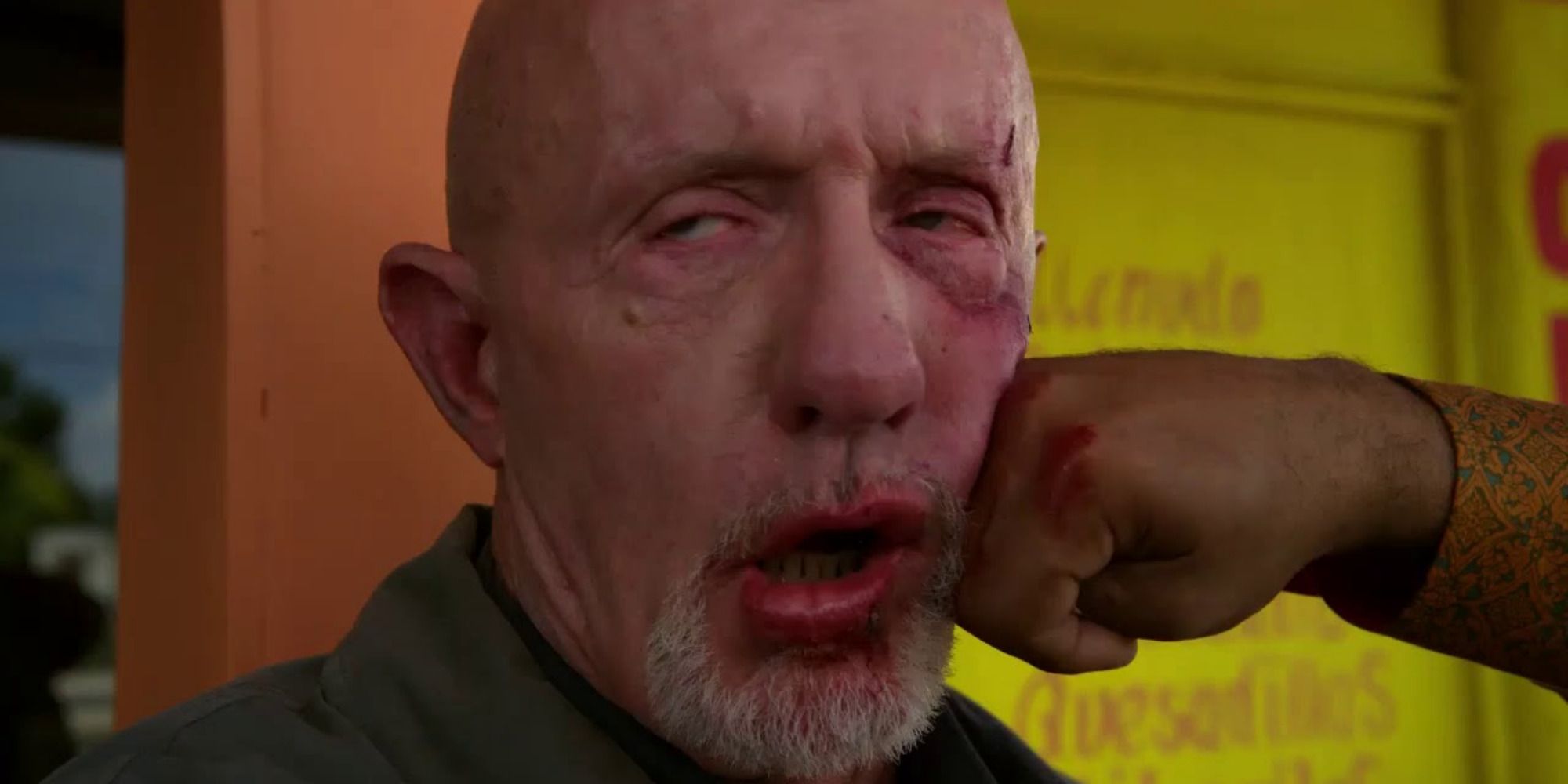 Tuco from "Better Call Saul"'s fist, punching a bloodied Mike