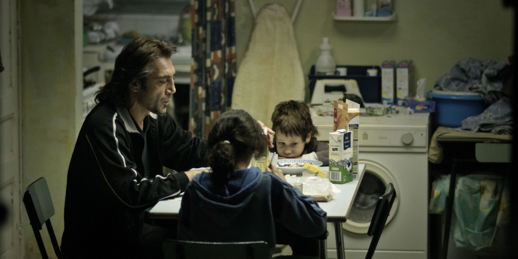 Uxbal and his children having dinner in "Biutiful"