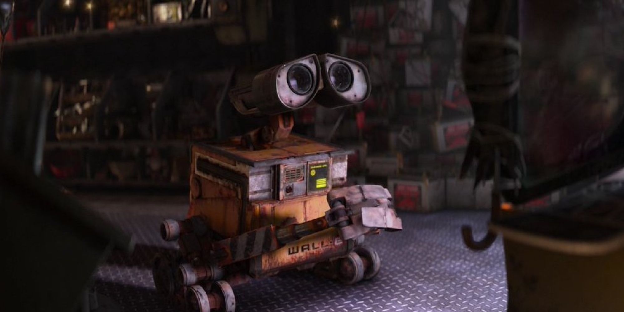 Wall-E holdings his hands