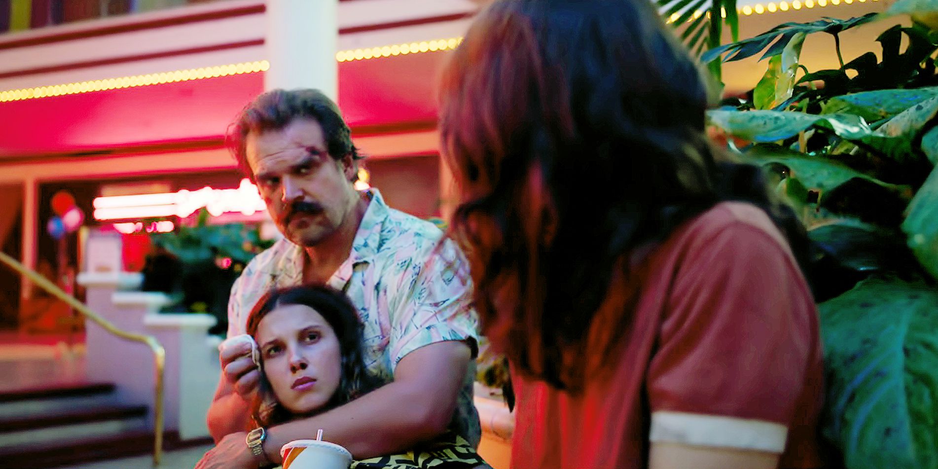 Joyce and Hopper Share a Look While Taking Care of Eleven on Stranger Things