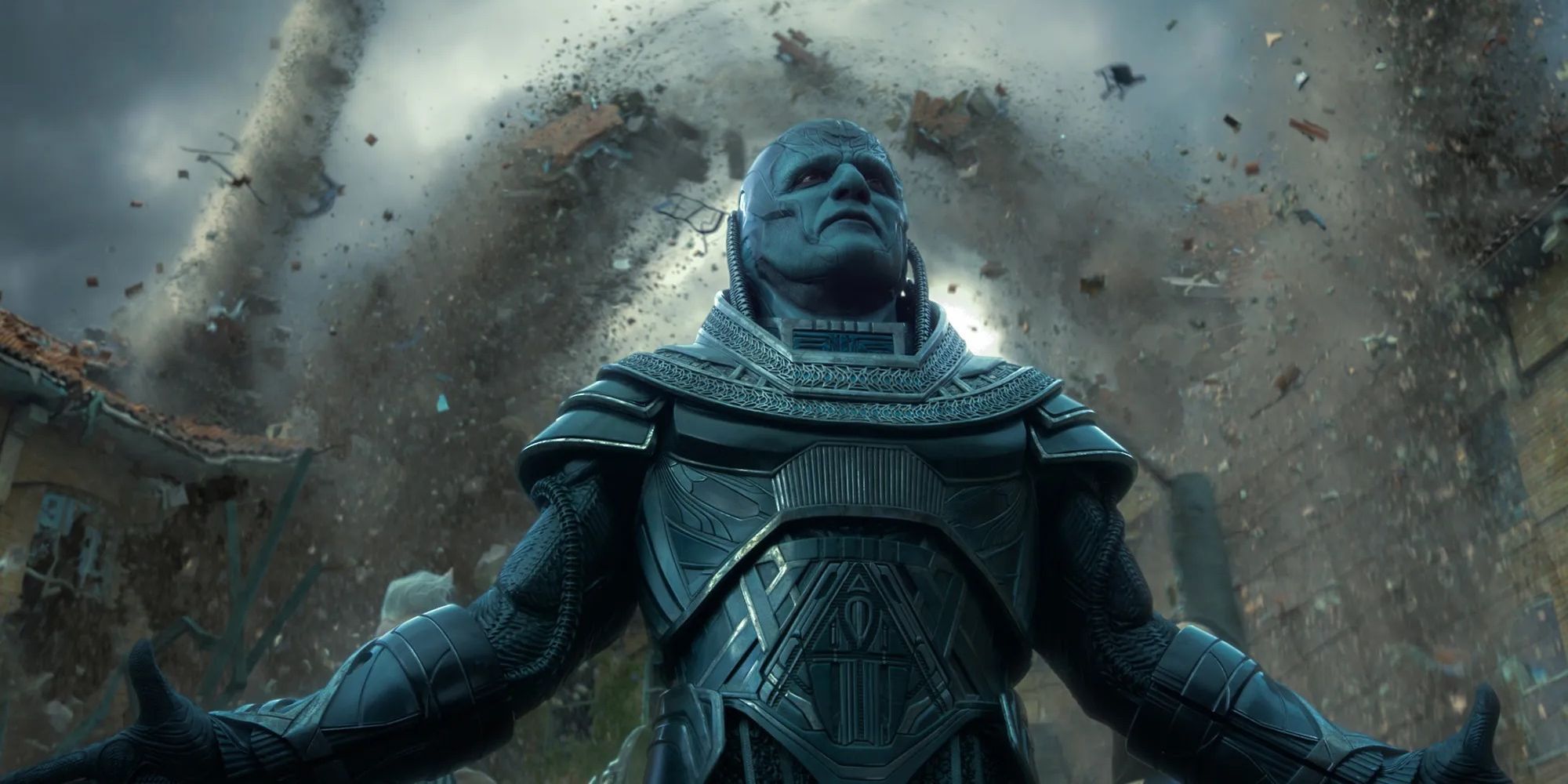 En Sabah Nur/Apocalypse, surrounded by flying debris with his arms outstretched in X-Men: Apocalypse