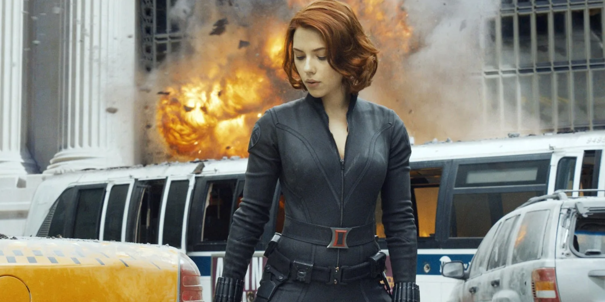 Black Widow (Scarlett Johansson) looks away from an explosion during the battle of New York in Avengers