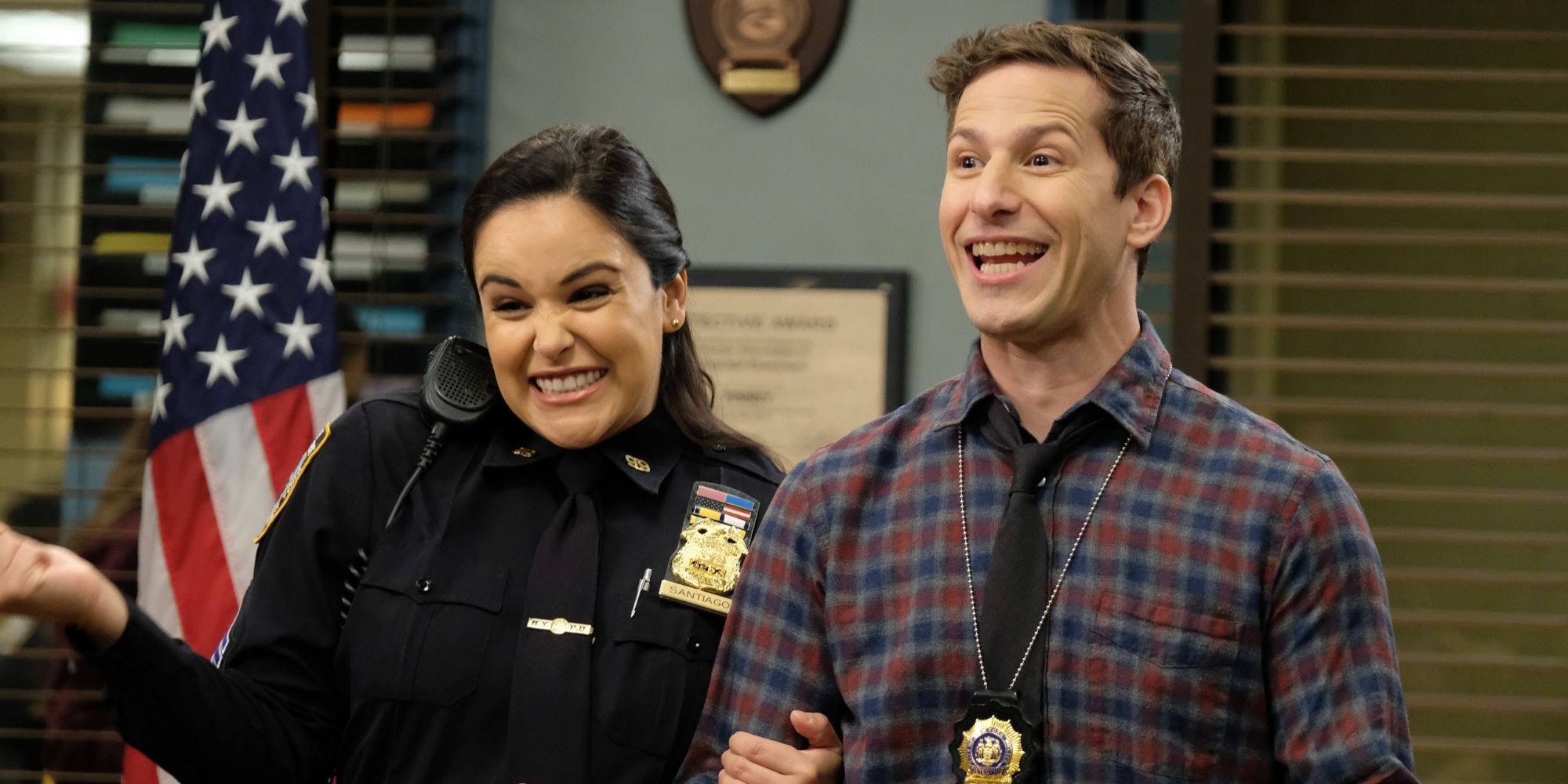 Andy Samberg as Jake Peralta and Melissa Fumero as Amy Santiago in Brooklyn Nine-Nine