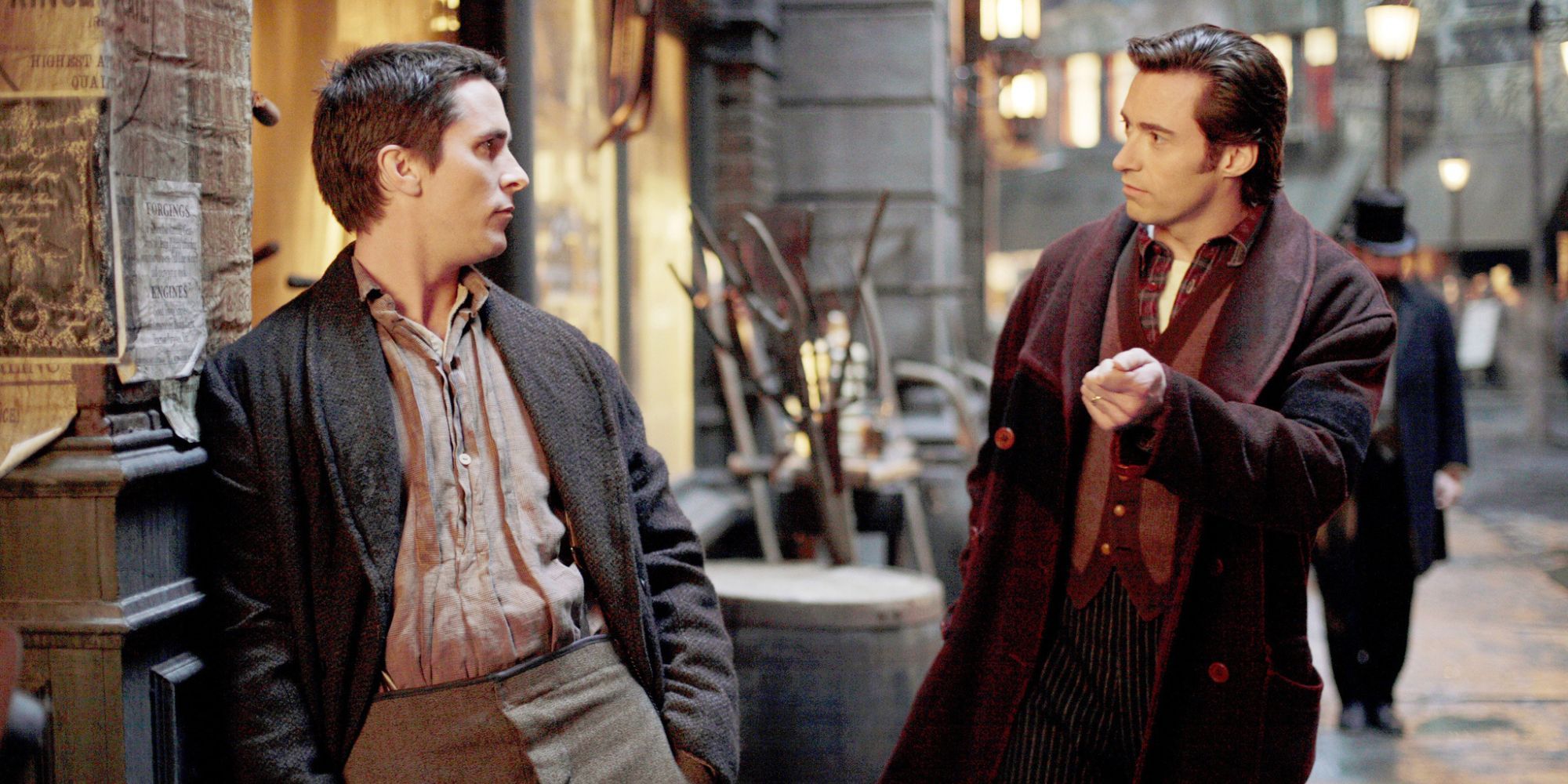 Christian Bale and Hugh Jackman as Borden and Angier talking on the street in The Prestige.