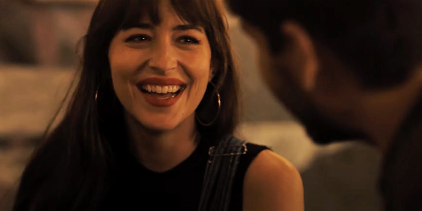 Dakota Johnson laughing at a man in a scene from 'Cha Cha Real Smooth'.