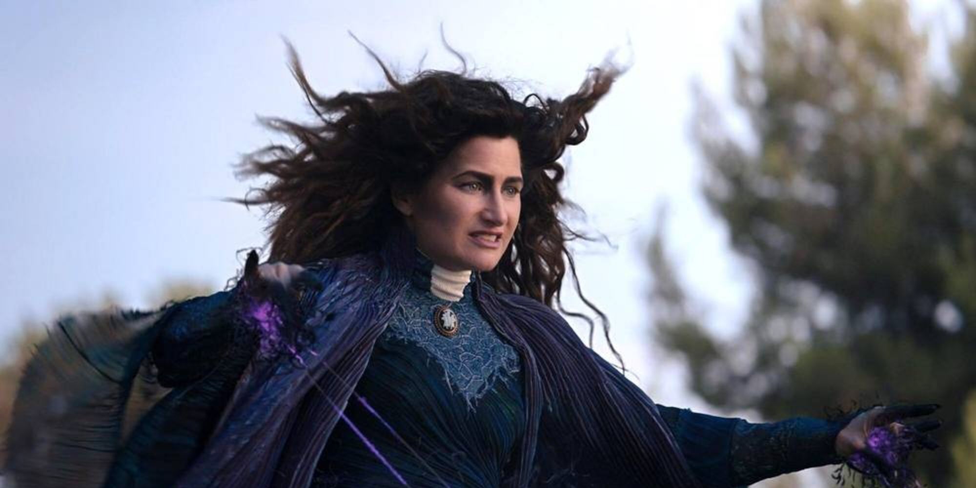 Kathryn Hahn as Agatha Harkness using her powers while hovering in the air in WandaVision.