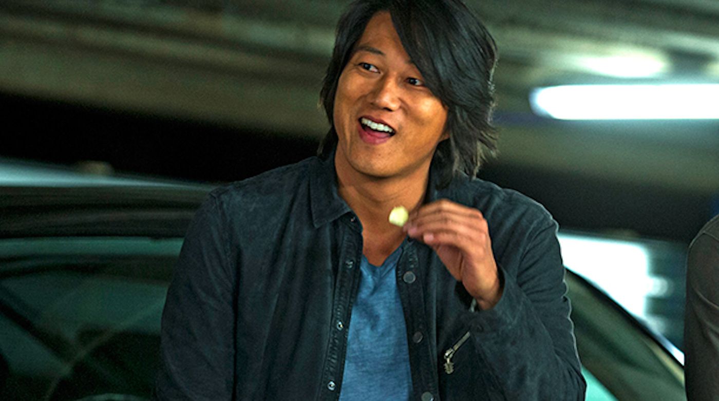 Sung Kang's Han (eating, as he is wont to do) in The Fast and the Furious: Tokyo Drift