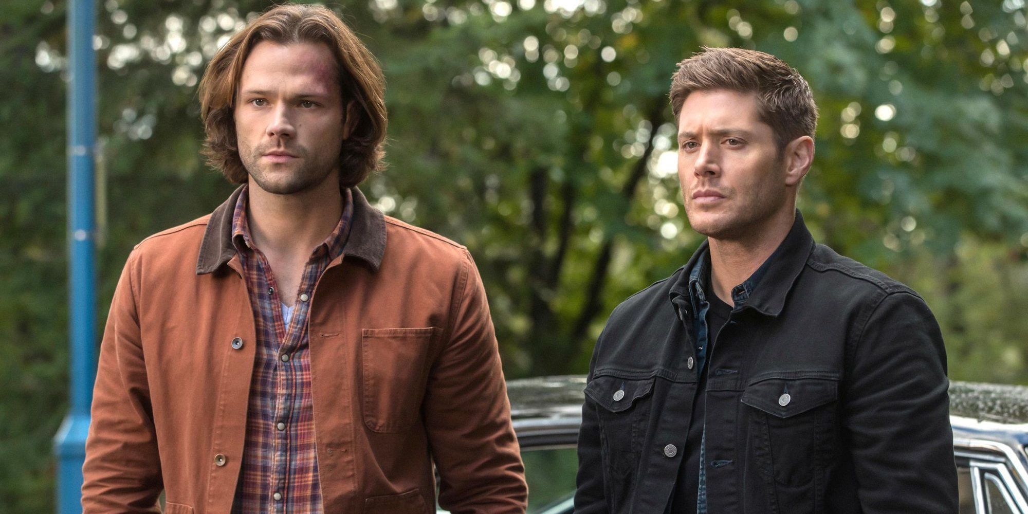 Jared Padalecki and Jensen Ackles as Sam and Dean Winchester looking to the distance in Supernatural