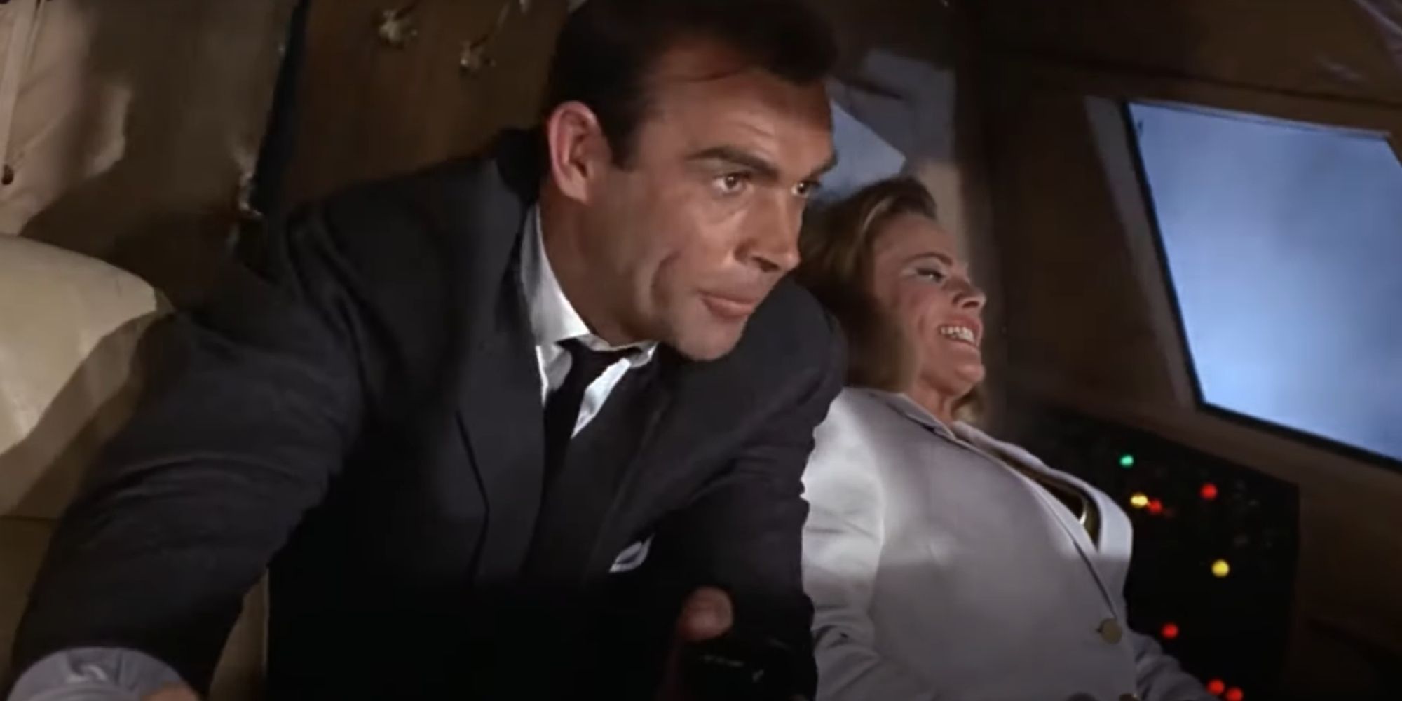 Bond and Pussy Galore search for a plan to escape the crashing plane 