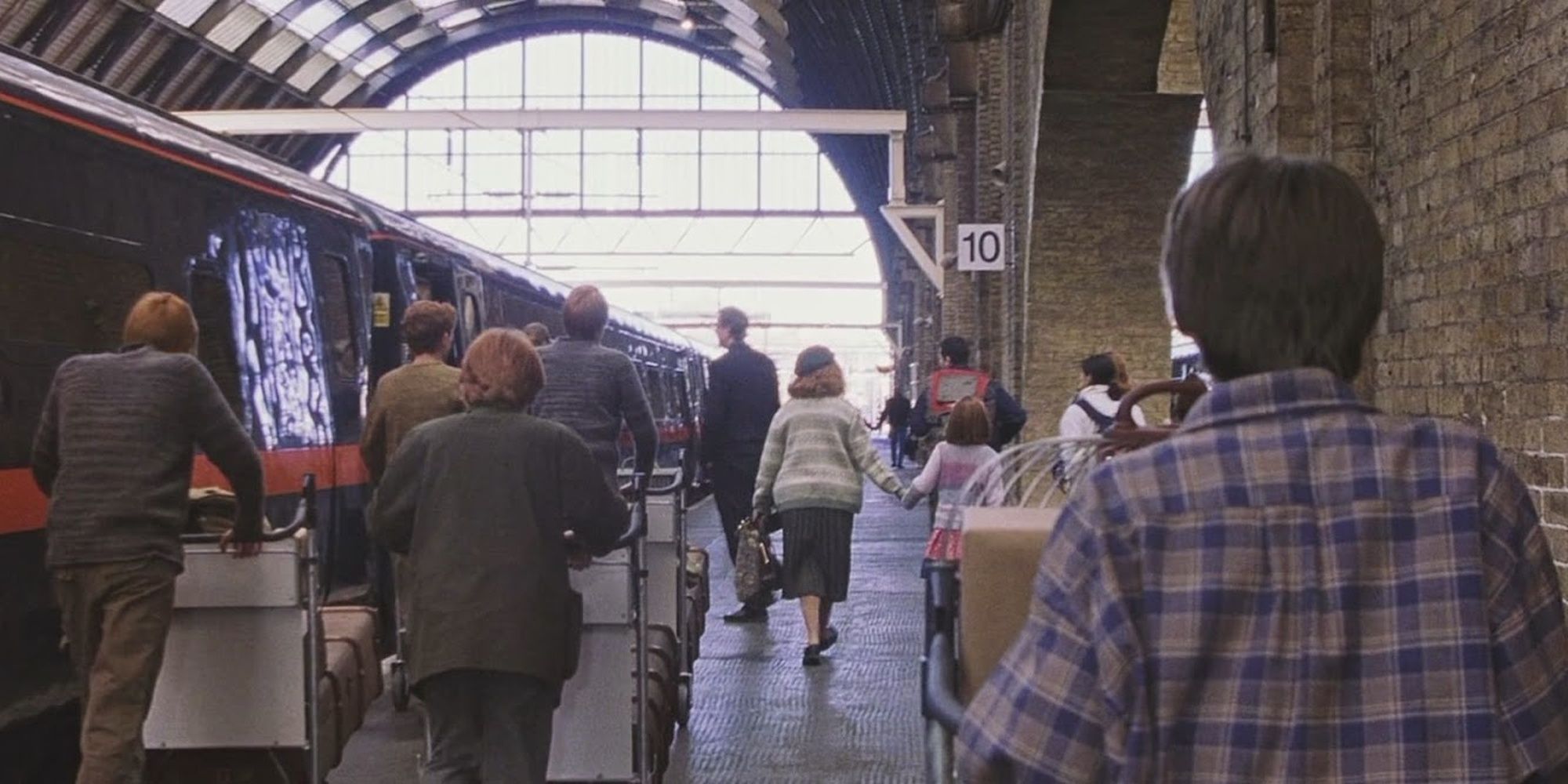 harry meets the weasley family on the platform