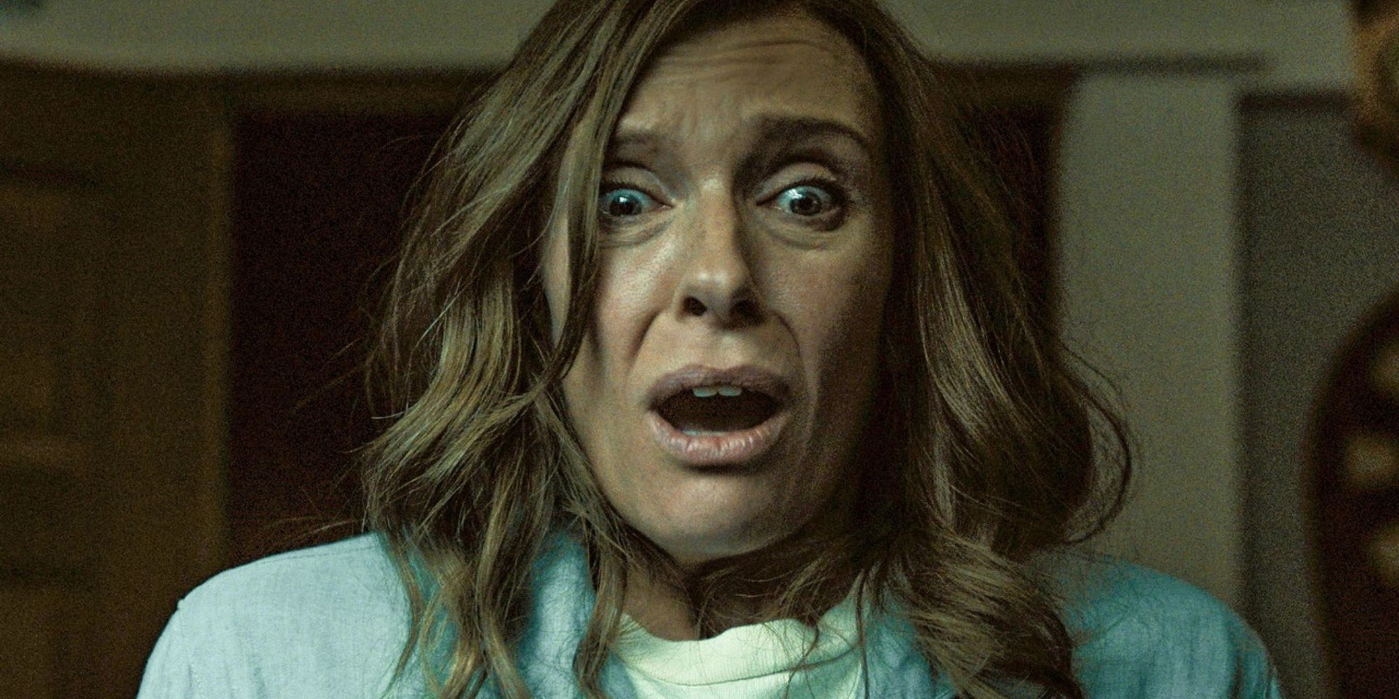 Toni Colette wearing a worried expression in 'Hereditary'