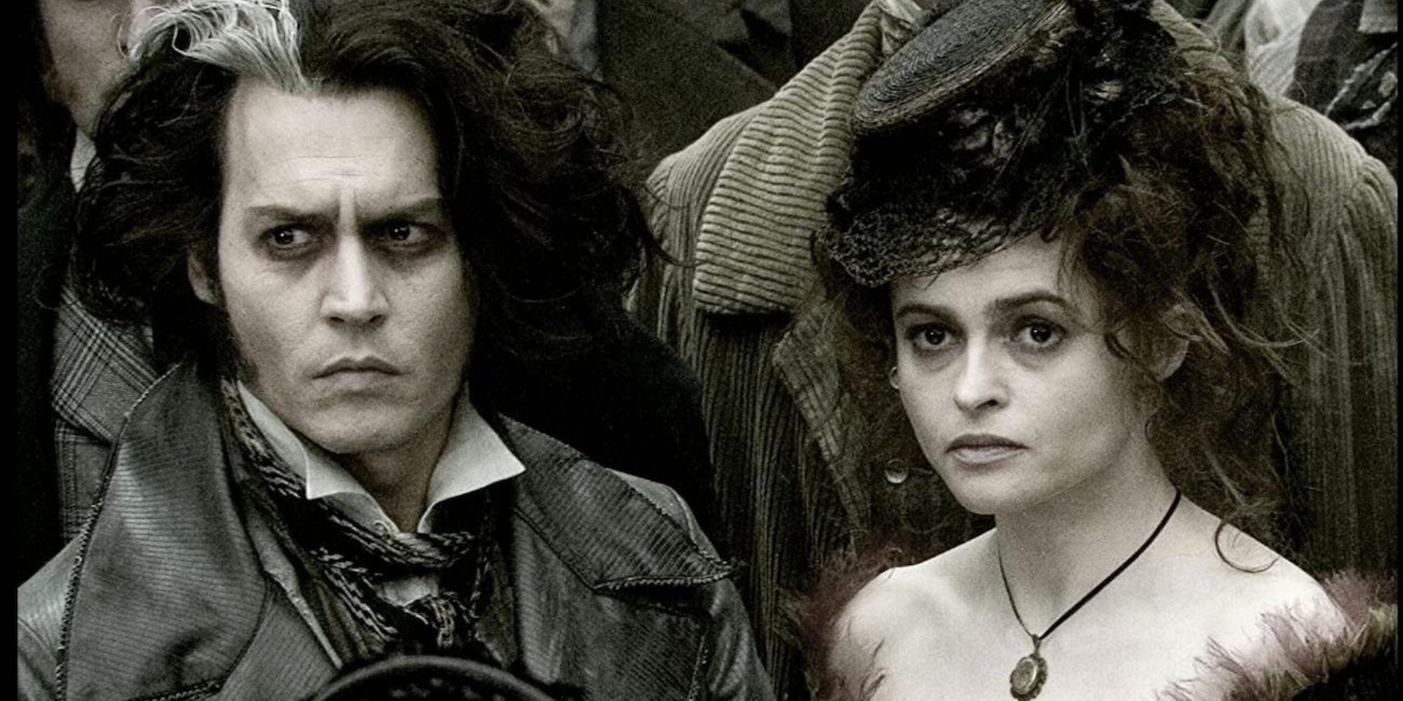 Johnny Depp as Sweeney Todd and Helena Bonham Carter as Mrs. Lovett in Sweeney Todd.