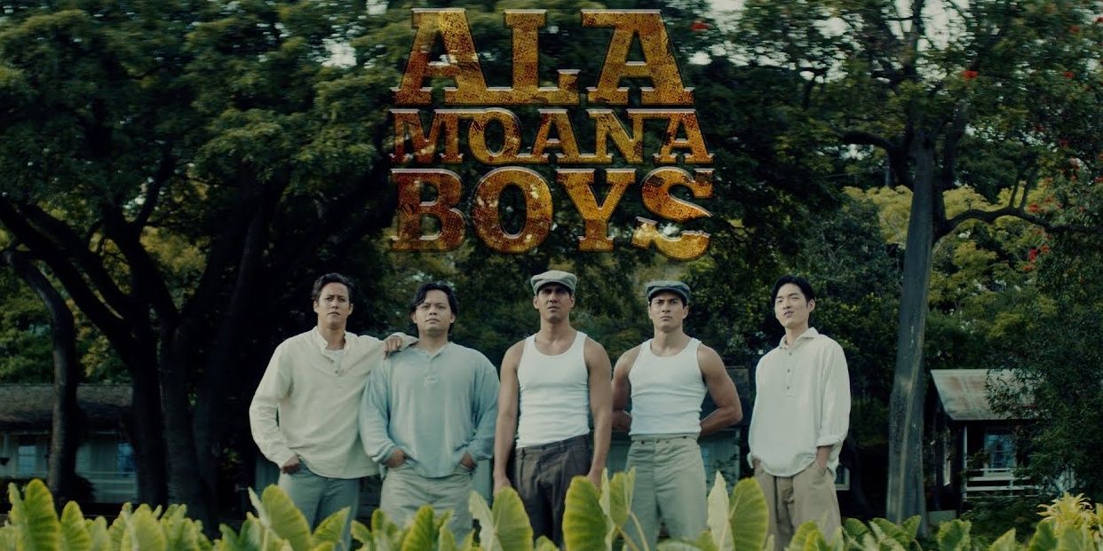 Actors from 'Ala Moana Boys' stand together behind greenery with serious expression on their faces