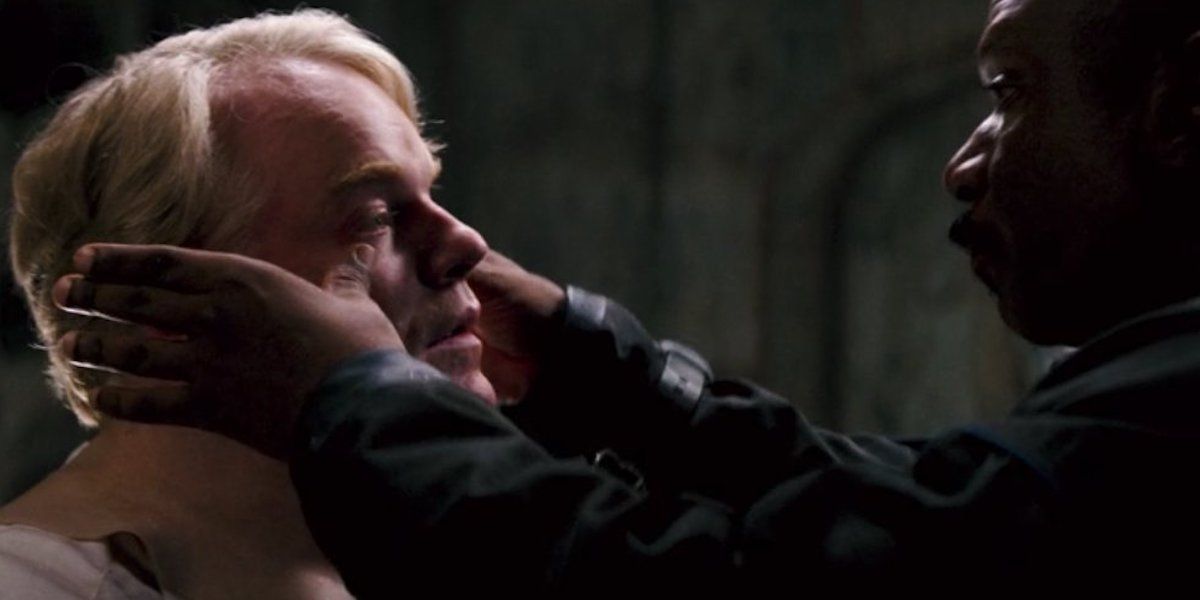 A Philip Seymour Hoffman mask being put on in Mission: Impossible III