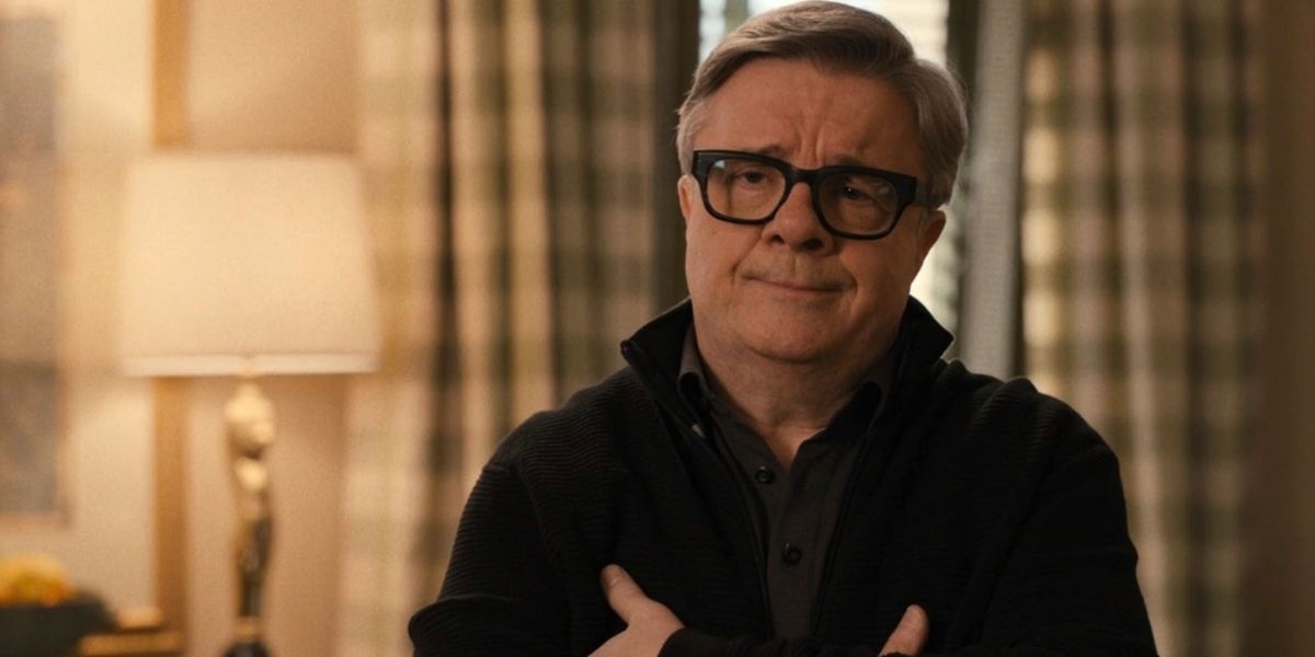 Nathan Lane as Teddy Dimas with his arms crossed in Only Murders in the Building.