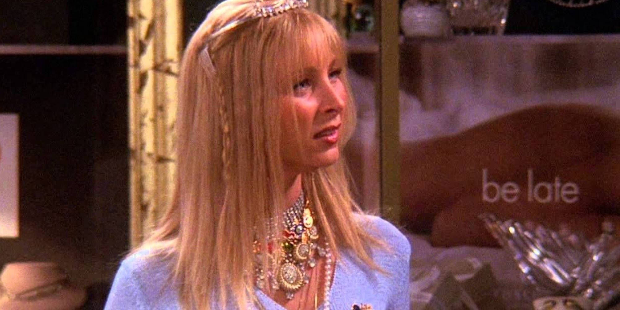 Phoebe looking intently at something off-camera in Friends.